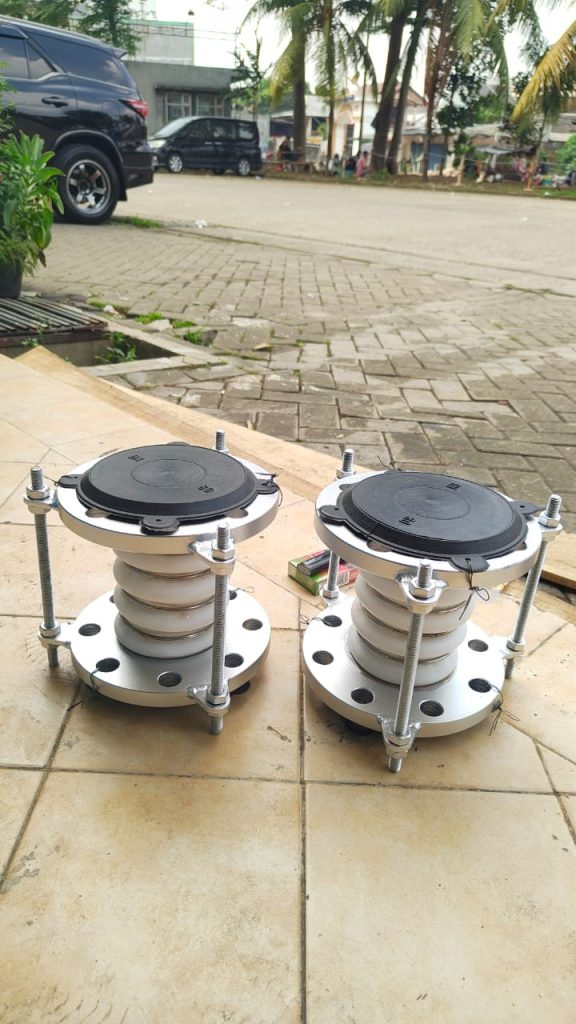 PTFE expansion joint for thermal expansion, vibration reduction, and chemical resistance in industrial piping systems.